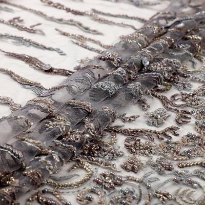 China ZO566 Sustainable High Quality Nigerian Hand Beaded Lace Fabrics With Sequin Tulle Lace Embroidery for sale