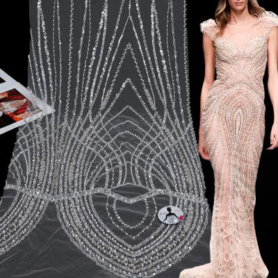 China Yanzi Sustainable 100% Polyester Tulle Embroidery Sequin Beaded Dress Lace Up Mesh Fabric Machine Embroidery Beads Decorated Embroidered for sale