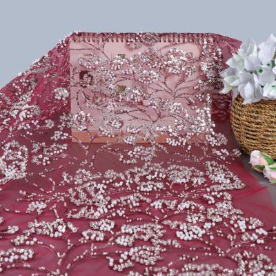 China Viable high quality D150 red color embroidery beaded lace fabric with beads and sequins fabric textiles for sale