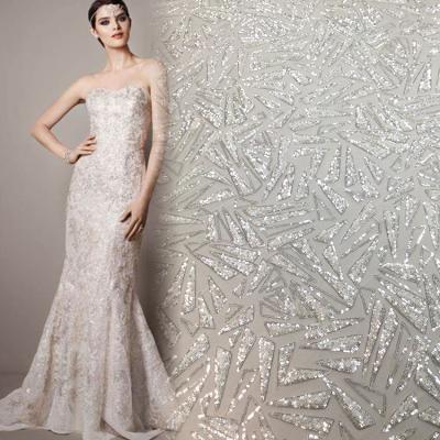 China New Design Dress Viable Custom Lace Fabric White Net Sequin Embroidery Lace for sale