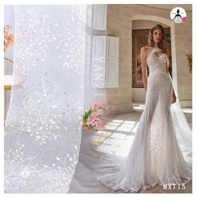 China MX715 2021 New Design Viable Bridal Lace Fabric Wedding Dress Embroidery Beaded Lace Machine With Women Wedding Dress Glitter Fabric for sale