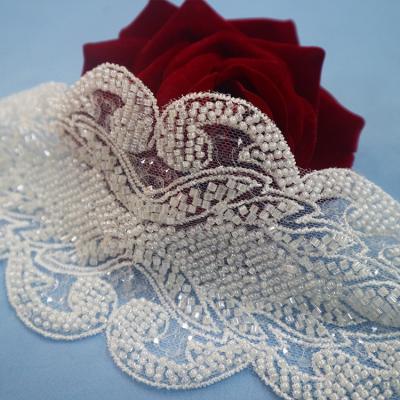 China Viable Luxury Embroidery Crystal Beaded Lace Trim, High Quality Beads Lace Trim Applique For Wedding Dress for sale