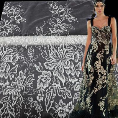 China Viable factory popular dress 100% Polyester lace material Yanzi Tulle lace design bridal glitter lace fabric for sale