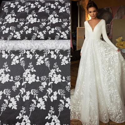 China Viable Wholesale White Yanzi Fabric Lace Dress Fabrics Making Dubai African Bridal High Quality Silver Powder Glitter Lace Fabric for sale