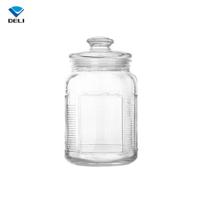 China Vintage 2.2L 74.4oz Etched Capacity Large Air Tight Glass Food Jar With Pattern for sale