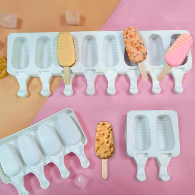 China Sustainable Food Grade 4 Cavities 8 Cavities Homemade DUMO Stripe Ice Cream Mold DIY Half Ice Cream Making Tool Silicone Popsicle Mold for sale