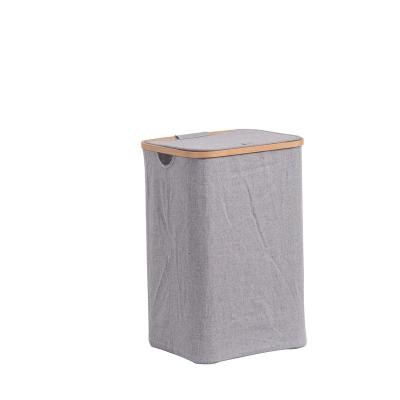 China Modern Laundry Basket With Handles Easily Carry Foldable Bamboo Laundry Basket With Lid for sale