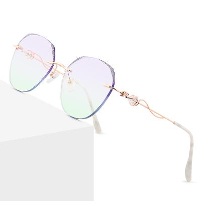 China Fashion sunglasses 2021 new design women sunglasses fashion sunglasses rimless sunglasses for sale