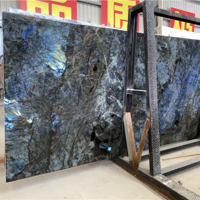 China Modern Hot Sale Luxury Lemurian Blue Granite Labradorite Natural Stone For Kitchen Countertops And Vantity Tops For Hotels for sale