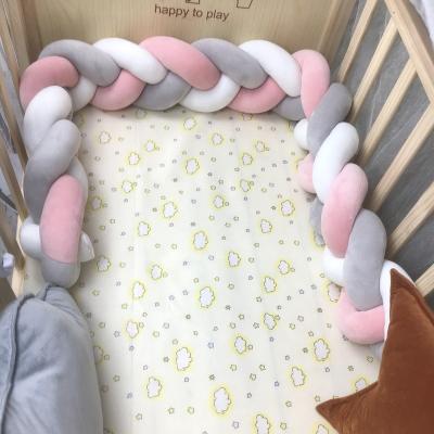 China Custom Soft Sustainable Baby Velvet Kids Rest Nursing Long Knot Pillow 3 Strands Braided Baby Crib Bumper For Newborn for sale