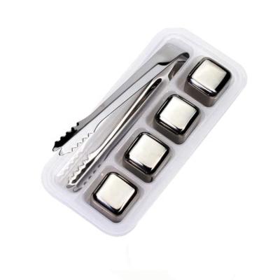 China Reusable Silver Stainless Steel Ice Cubes Whiskey 4PCS Cooling Stone with Tongs and Tray for sale