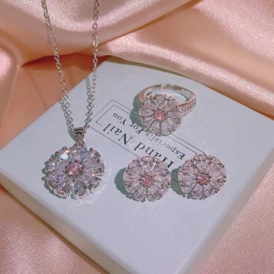 China Luxury Daisy Earrings Necklace Ring Three Piece Jewelry Display Set Fashion Silver Bridal Jewelry Set Custom Made Environmental Friendly for sale