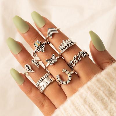 China Cuban 2022 Environmental Friendly Vintage Girls Horseshoe Ring Diamond Ring Set Wing Butterfly Geometric Ring Eight Piece Set for sale