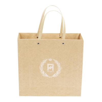 China Recyclable Degradable Fast Delivery E-commerce Washable Kraft Paper Bags With Rope Handle for sale