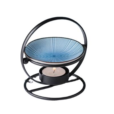 China Guarantee Quality Ceramic Flower Ceramic Basket Aromatherapy Round Aroma Furnace for sale