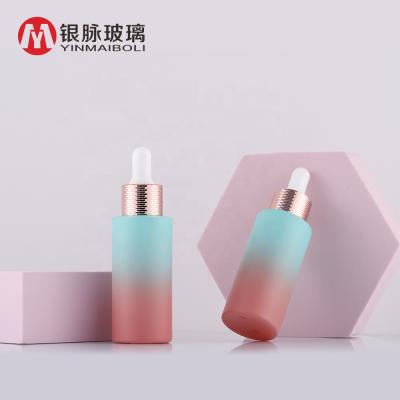 China Personal Care Gradient Fancy Color Flat Shoulder Dropper Glass Bottle For Serum Essential Oil 30ml for sale