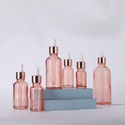 China Custom Translucent Rose Gold Personal Care Empty Essential Oil 10ml 20ml 30ml 30ml 50ml 100ml Dropper Glass Bottle for sale