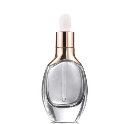 China Wholesale Guangzhou 15ml 30ml Square Personal Care Glass Bottle With Rose Gold Aluminum Cap Rubber Dropper Top For Use Essence Liquid for sale