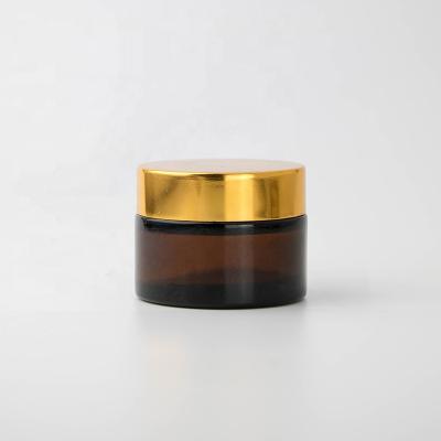 China Personal Care 20g 30g 50g Amber Glass Cream Jar Cosmetic Wide Mouth Skin Care Jar With Lid Custom In Printing for sale