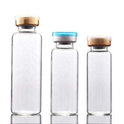 China Personal Care Empty Cosmetic Packaging Clear Glass Medical Cosmetic Vials With Rubber Inner Plug And Cover for sale