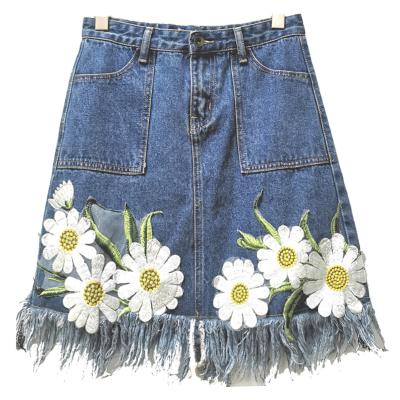 China New fashion viable ladies edge ripped-faryed edge denim skirt embroidered patch women skirt for sale