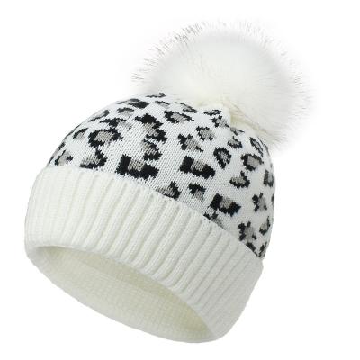 China breathable & Waterproof Women's Beanie Leopard Knit Hats Women's Knitted Hats Loose Fur Balls Soft Warm Winter for sale