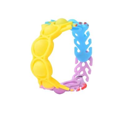 China Fast Shipping Popular Adjustable Worry Relife Compression Wiggle Bracelet Wiggle Sensory Toys For Kids for sale