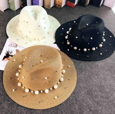 China Fashion\Comfortable British Flat\Durable Brim Straw Hats Summer Women Vacation Beach Sun Protection Outdoor Hat Pearl Top Hat for sale