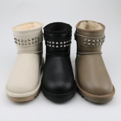 China Lightweight easy pull-on entry sheepskin boots with metal star to decorate for sale