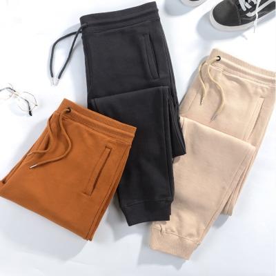 China Anti-Static Casual Gym Workout Track Pants Comfortable Slim Fit Tapered Mens Sweatpants With Pockets for sale