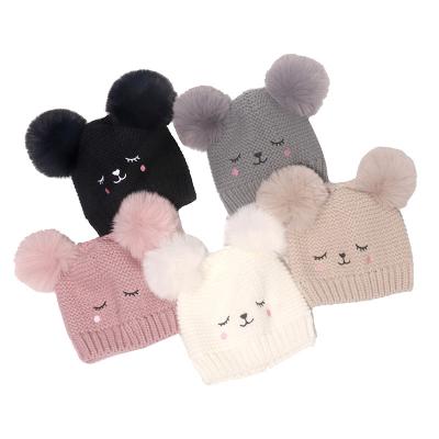 China COMMON Fashion Winter Infant Cartoon Cat Fur Kids Beanies Acrylic Baby Knit Hat With Faux Fur Double Pom Pom for sale