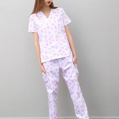 China Comfortable Breathable Custom Factory Price Best Logo Sexy Active 3 Pockets Classic Printing Scrubs Sets for sale