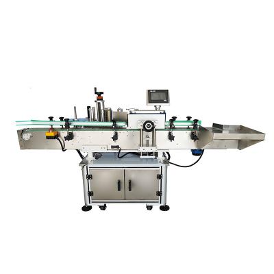 China Vertical Food HDPE Round Bottle Sticker Labeling Machine PLC Based Round Bottle Sticker Labeling Machine for sale