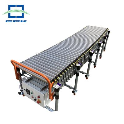 China Industry Heat Resistant Warehouse Motorized Carrier Expandable Stretch Flexible Roller Conveyor for sale