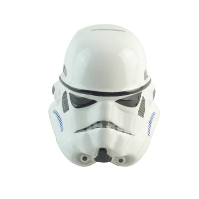 China Save The Black Ceramic Helmet Money Hero Character Gift Ceramic Piggy Bank Coin Bank for sale