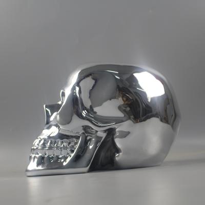 China Environmental protection decorative creative indoor resin statue art shop resin statue Europe various skull craft ornaments for sale