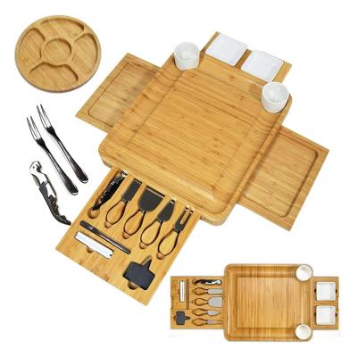 China Hot Sale Bamboo Pizza Board Stocked Cheese Dish Tray With 4 Sides Hidden Cutlery Drawer for sale