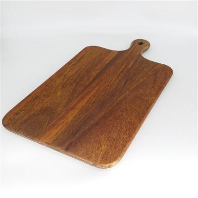 China Unique Europe Wooden Chopping Cutting Board With Handle for sale