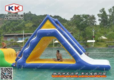 China 0.9mm Pvc Tapaulin Airtight Floating Inflatable Water Slide For Adults for sale