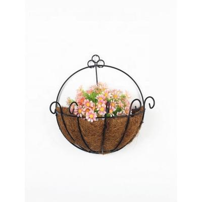 China Handmade Indoor Outdoor Decoration Iron Half Around Plant Flower Wall Rack With Cocos Coir Coating Plant Hanger for sale