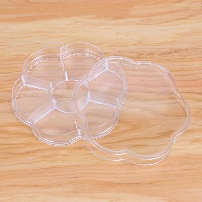 China PP Plum Blossom 7 Small Mini Clear Plastic Grid Jewelry Multifunctional Cosmetic Storage Box for sale