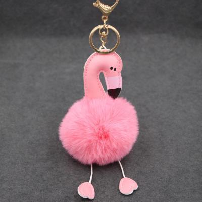 China Fluffy and Cute Pink Flamingo Pom Pom Decoration PU Girl Key Chain for sale