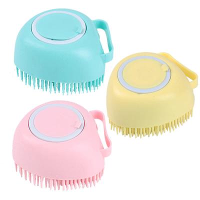 China Viable Hot Sale Silicone Pet Bath Brush Soap Dispenser Cat Dog Massage Brush Pet Grooming Brush for sale