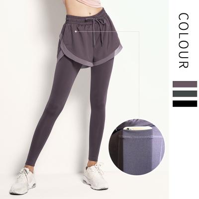 China 2021 Breathable New Fast Delivery Fake Two Piece Skinny Fitness Pants Workout Gym Sports Jogging Yoga Hip-lifting Leggings With Pouch for sale