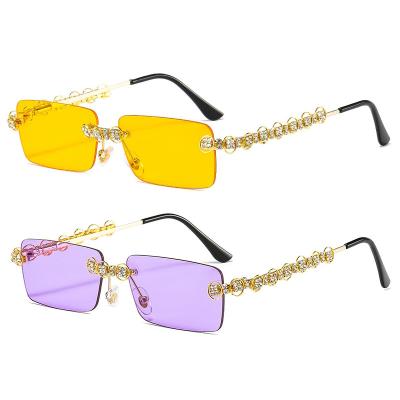 China 2022Wholesale Fashion Sunglasses Shape Women's Rimless Square Frame UV400 Sun Glass Sunglasses for sale