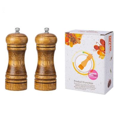 China Viable Ceramic Kitchen Utensils Dig Wooden Salt and Pepper Mills Shakers 5 Inch Black Pepper Grinder for sale