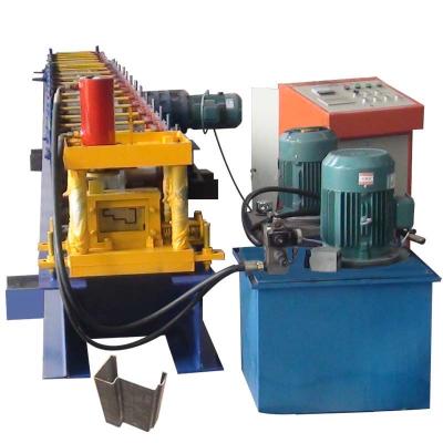 China Gcr15 Steel Hydraulic Steel Door Frame Roll Forming Making Machine for sale