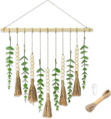 China DIY Soft Faux Wood Stick Artificial Eucalyptus Wall Hanging With Bead Wood Garland for sale