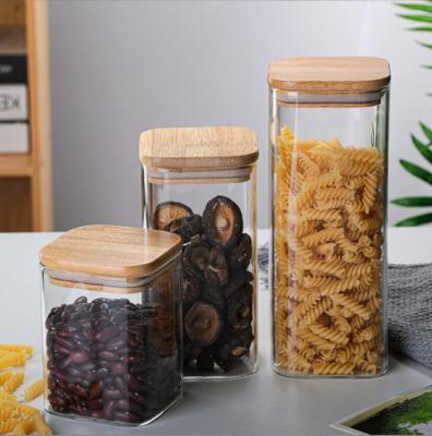 China Heatable Multifunctional Glass Food Storage Containers With Bamboo Lids Airtight Kitchen Storage Place Jars Set for sale