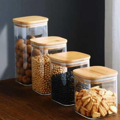 China Heatable Food Storage Containers With Bamboo Lids Square Jars Airtight Kitchen Set Glass Multifunctional Storage Glass Jar for sale